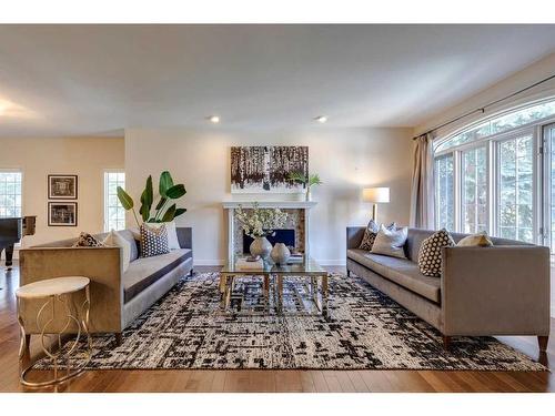 115-5555 Elbow Drive Sw, Calgary, AB - Indoor Photo Showing Living Room With Fireplace