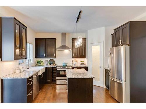 115-5555 Elbow Drive Sw, Calgary, AB - Indoor Photo Showing Kitchen With Stainless Steel Kitchen With Upgraded Kitchen