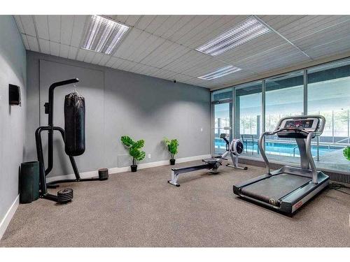 1510-4944 Dalton Drive Nw, Calgary, AB - Indoor Photo Showing Gym Room