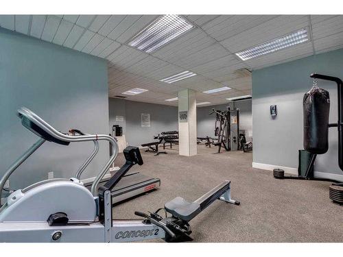 1510-4944 Dalton Drive Nw, Calgary, AB - Indoor Photo Showing Gym Room