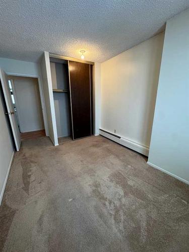 1510-4944 Dalton Drive Nw, Calgary, AB - Indoor Photo Showing Other Room