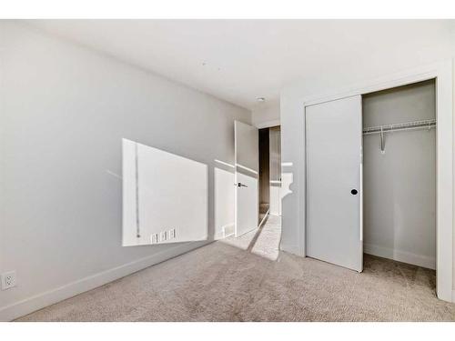 248 Seton Passage Se, Calgary, AB - Indoor Photo Showing Other Room