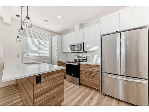 248 Seton Passage Se, Calgary, AB - Indoor Photo Showing Kitchen With Stainless Steel Kitchen With Upgraded Kitchen