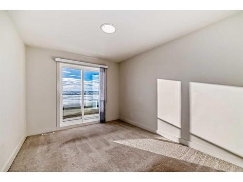 248 Seton Passage Se, Calgary, AB - Indoor Photo Showing Other Room