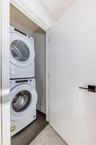 248 Seton Passage Se, Calgary, AB - Indoor Photo Showing Laundry Room