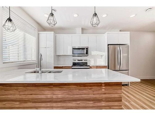 248 Seton Passage Se, Calgary, AB - Indoor Photo Showing Kitchen With Stainless Steel Kitchen With Double Sink With Upgraded Kitchen