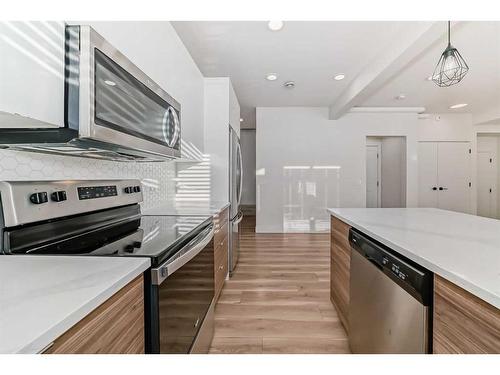 248 Seton Passage Se, Calgary, AB - Indoor Photo Showing Kitchen With Stainless Steel Kitchen