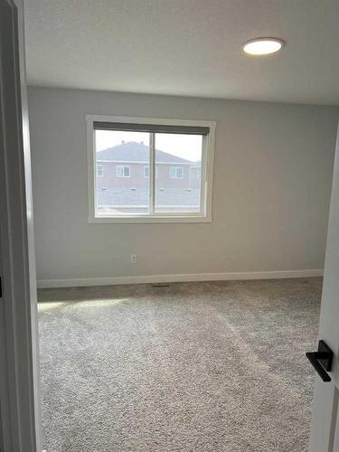 19 Walcrest Row Se, Calgary, AB - Indoor Photo Showing Other Room