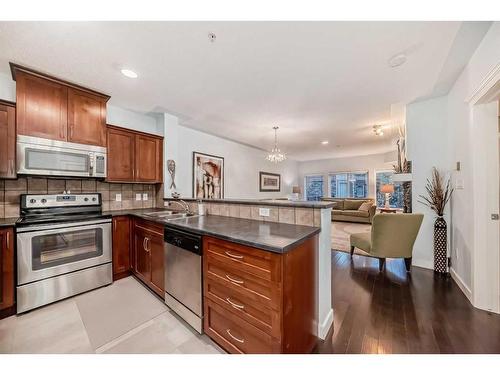 116-30 Discovery Ridge Close Sw, Calgary, AB - Indoor Photo Showing Kitchen With Double Sink