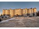 116-30 Discovery Ridge Close Sw, Calgary, AB  - Outdoor With Balcony With Facade 