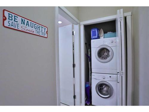 123-823 5 Avenue Nw, Calgary, AB - Indoor Photo Showing Laundry Room