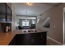 72 New Brighton Point Se, Calgary, AB  - Indoor Photo Showing Kitchen With Double Sink 