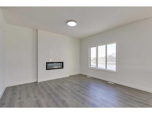 224 Sora Terrace Se, Calgary, AB - Indoor With Fireplace