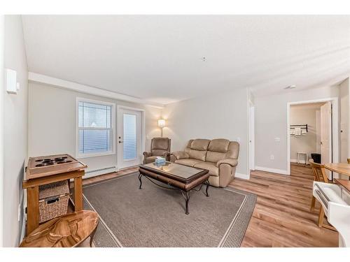 3106-3000 Millrise Point Sw, Calgary, AB - Indoor Photo Showing Living Room