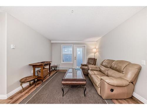 3106-3000 Millrise Point Sw, Calgary, AB - Indoor Photo Showing Living Room