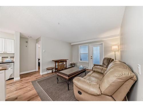 3106-3000 Millrise Point Sw, Calgary, AB - Indoor Photo Showing Living Room