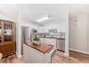 3106-3000 Millrise Point Sw, Calgary, AB  - Indoor Photo Showing Kitchen With Stainless Steel Kitchen 