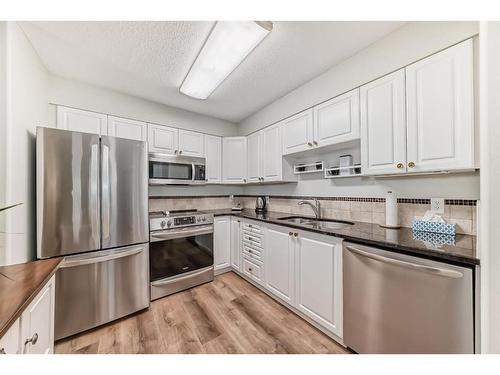 3106-3000 Millrise Point Sw, Calgary, AB - Indoor Photo Showing Kitchen With Stainless Steel Kitchen