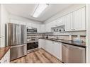 3106-3000 Millrise Point Sw, Calgary, AB  - Indoor Photo Showing Kitchen With Stainless Steel Kitchen 