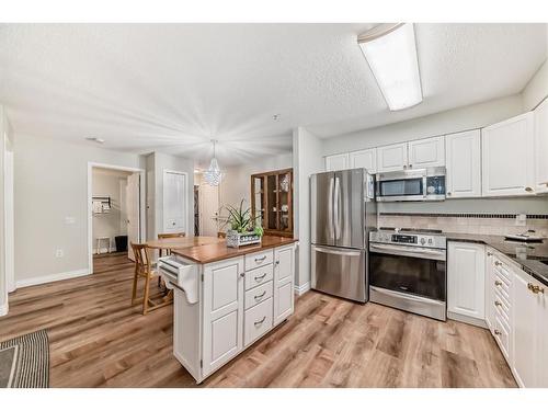 3106-3000 Millrise Point Sw, Calgary, AB - Indoor Photo Showing Kitchen With Stainless Steel Kitchen With Upgraded Kitchen