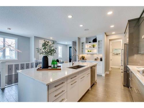 74 Clear Creek Place, Rural Rocky View County, AB - Indoor Photo Showing Kitchen With Double Sink With Upgraded Kitchen