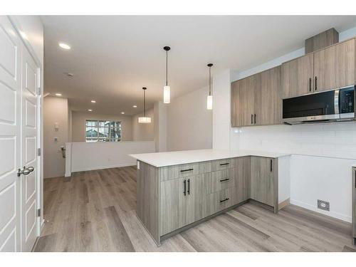 822 Creekside Boulevard Sw, Calgary, AB - Indoor Photo Showing Kitchen