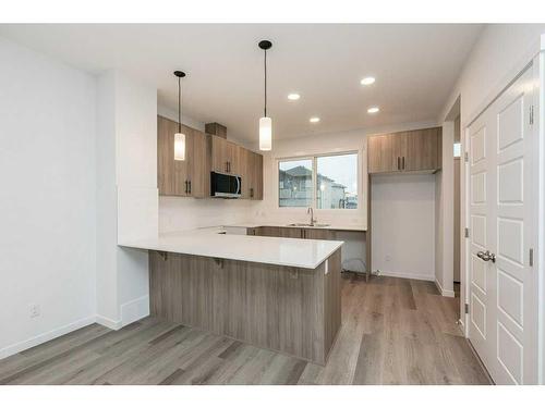 822 Creekside Boulevard Sw, Calgary, AB - Indoor Photo Showing Kitchen