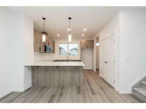 822 Creekside Boulevard Sw, Calgary, AB - Indoor Photo Showing Kitchen