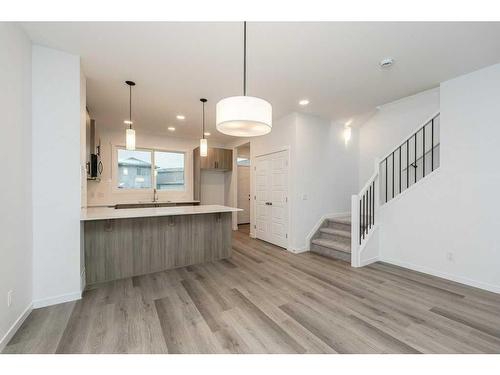 822 Creekside Boulevard Sw, Calgary, AB - Indoor Photo Showing Kitchen