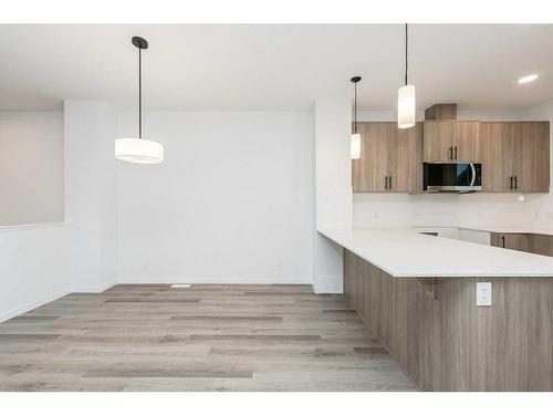 822 Creekside Boulevard Sw, Calgary, AB - Indoor Photo Showing Kitchen