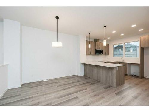 822 Creekside Boulevard Sw, Calgary, AB - Indoor Photo Showing Kitchen With Upgraded Kitchen