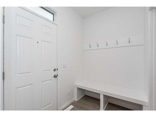 822 Creekside Boulevard Sw, Calgary, AB - Indoor Photo Showing Other Room