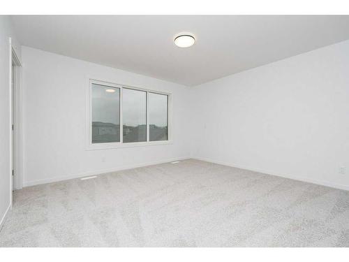 822 Creekside Boulevard Sw, Calgary, AB - Indoor Photo Showing Other Room