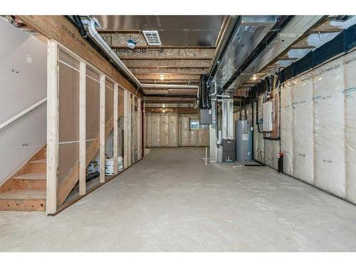 822 Creekside Boulevard Sw, Calgary, AB - Indoor Photo Showing Basement