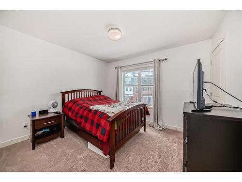 575 Sherwood Boulevard Nw, Calgary, AB - Indoor Photo Showing Bedroom