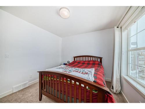 575 Sherwood Boulevard Nw, Calgary, AB - Indoor Photo Showing Bedroom