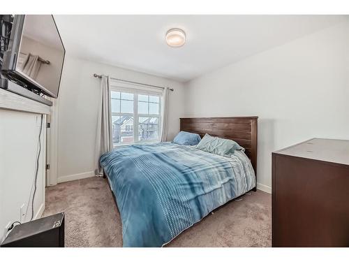 575 Sherwood Boulevard Nw, Calgary, AB - Indoor Photo Showing Bedroom