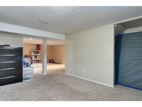 30 4Th Avenue Se, High River, AB - Indoor Photo Showing Other Room