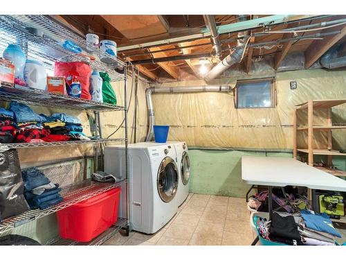 30 4Th Avenue Se, High River, AB - Indoor Photo Showing Laundry Room