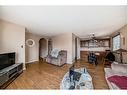 723 Raynard Crescent Se, Calgary, AB  - Indoor Photo Showing Living Room 