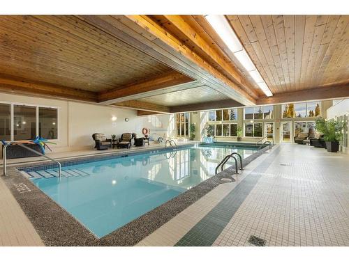 246-6868 Sierra Morena Boulevard Sw, Calgary, AB - Indoor Photo Showing Other Room With In Ground Pool