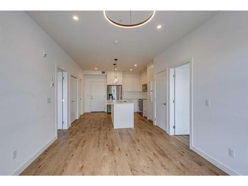 1216-681 Savanna Boulevard Ne, Calgary, AB - Indoor Photo Showing Kitchen