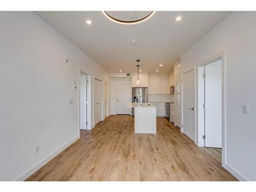 1216-681 Savanna Boulevard Ne, Calgary, AB - Indoor Photo Showing Kitchen