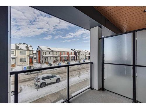 1216-681 Savanna Boulevard Ne, Calgary, AB - Outdoor With Balcony With Exterior