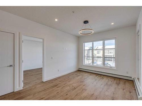 1216-681 Savanna Boulevard Ne, Calgary, AB - Indoor Photo Showing Other Room