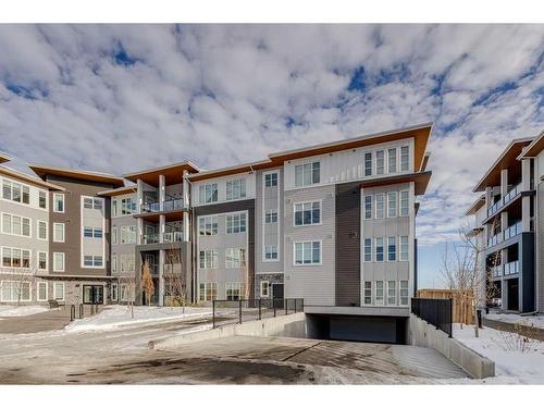 1216-681 Savanna Boulevard Ne, Calgary, AB - Outdoor With Balcony With Facade