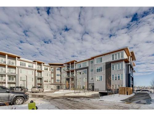 1216-681 Savanna Boulevard Ne, Calgary, AB - Outdoor With Balcony With Facade