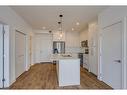 1216-681 Savanna Boulevard Ne, Calgary, AB  - Indoor Photo Showing Kitchen With Upgraded Kitchen 