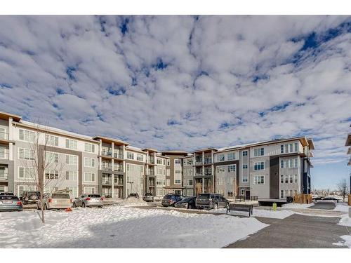 1216-681 Savanna Boulevard Ne, Calgary, AB - Outdoor With Balcony With Facade