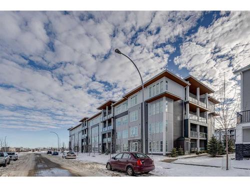 1216-681 Savanna Boulevard Ne, Calgary, AB - Outdoor With Balcony With Facade